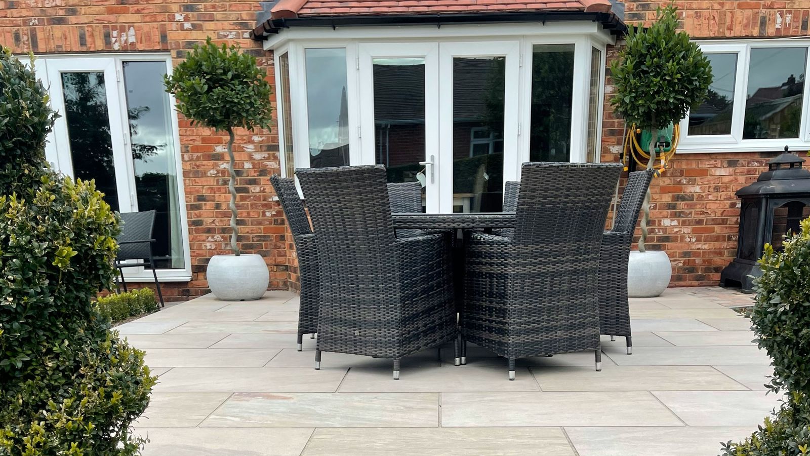 Landscaped garden patio with paving and planting